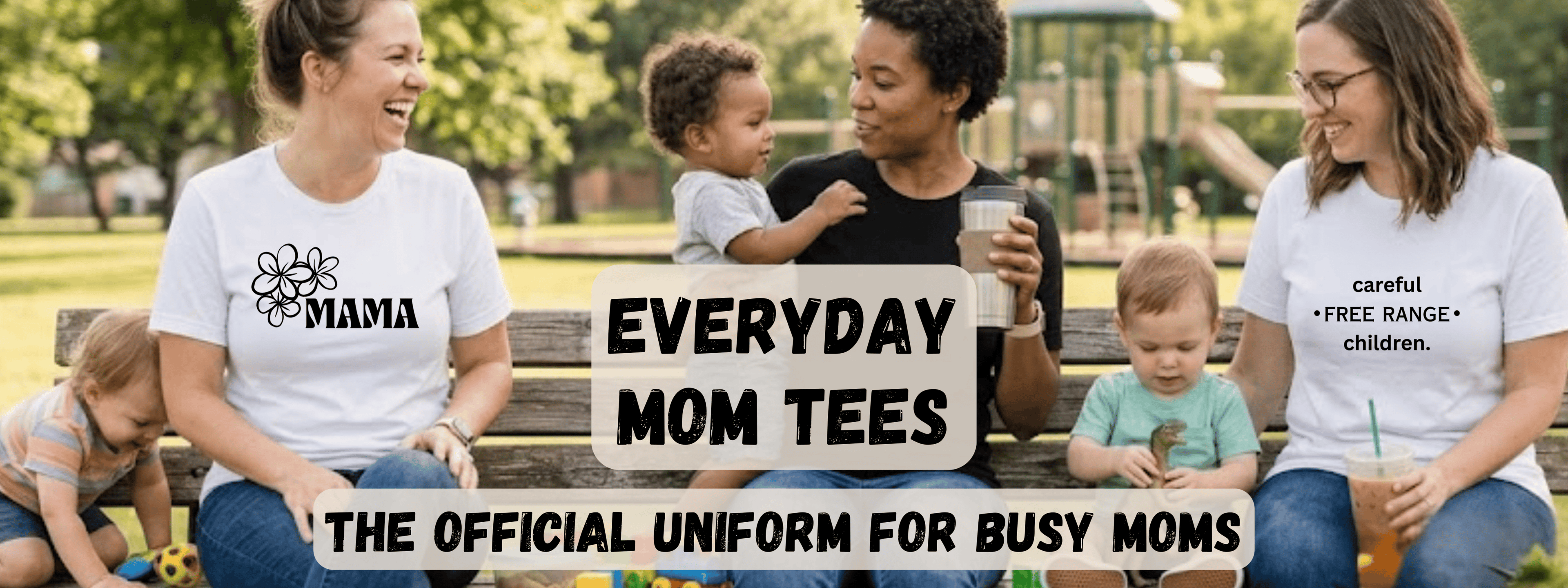 Three women sitting on a park bench with children, wearing 'MAMA' and 'Everyday Mom Tees' shirts.
