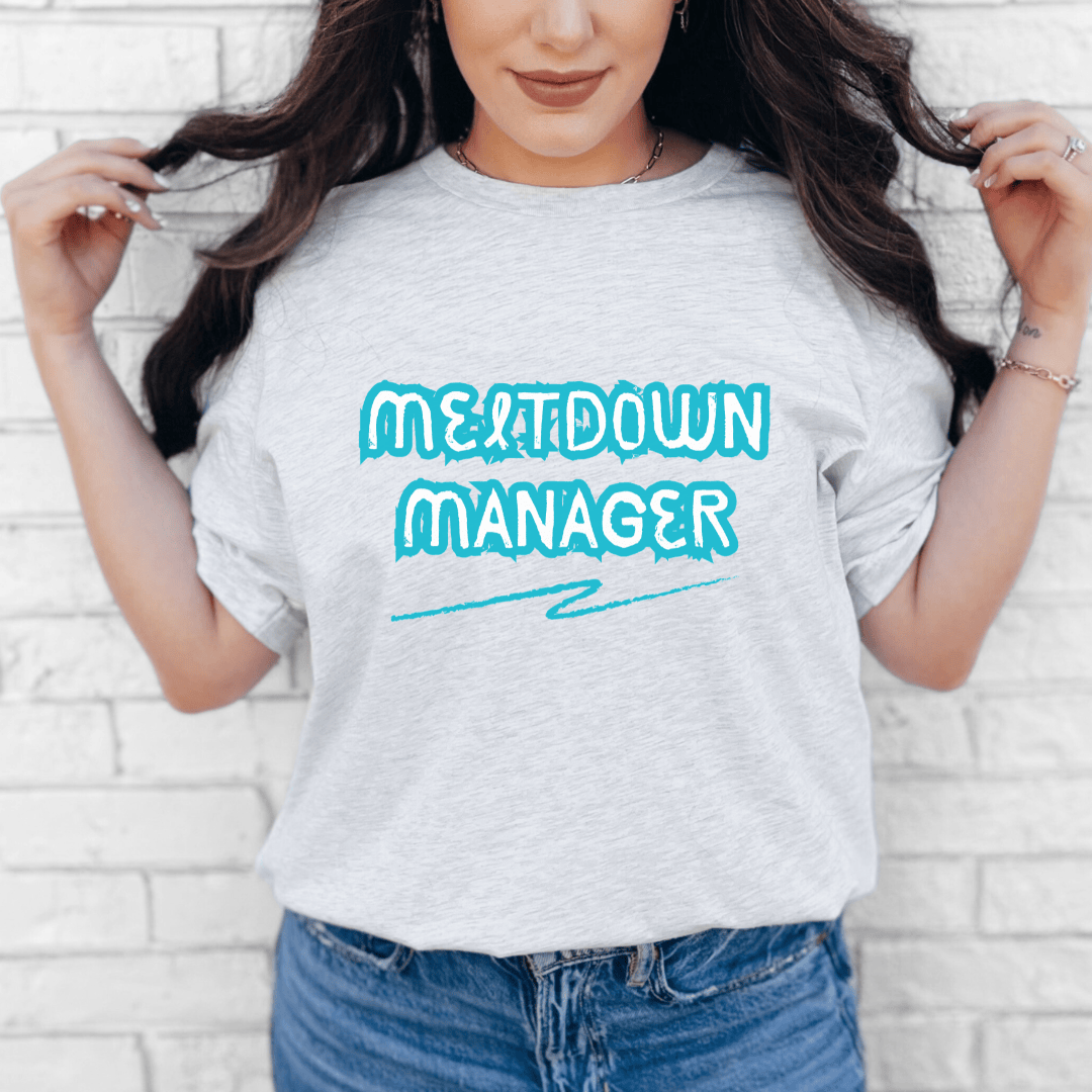 mom life tee that says Meltdown Manager Funny Mom T-Shirt for moms