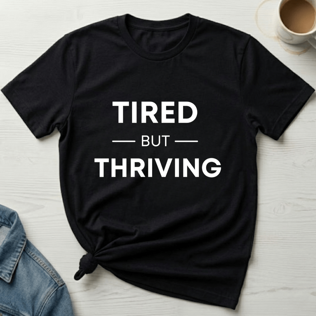 mom life tee that says Tired but Thriving Mom T-Shirt for moms
