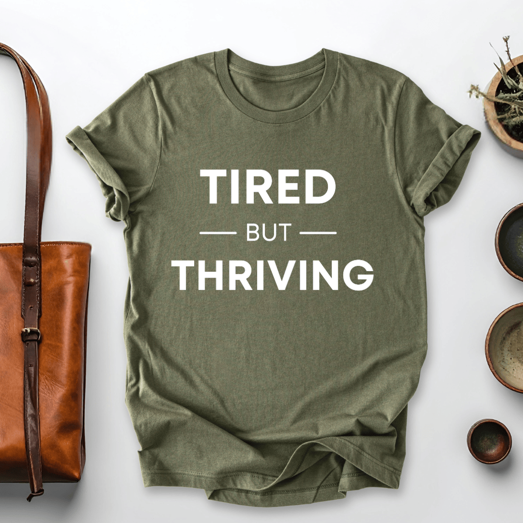 mom life tee that says Tired but Thriving Mom T-Shirt for moms