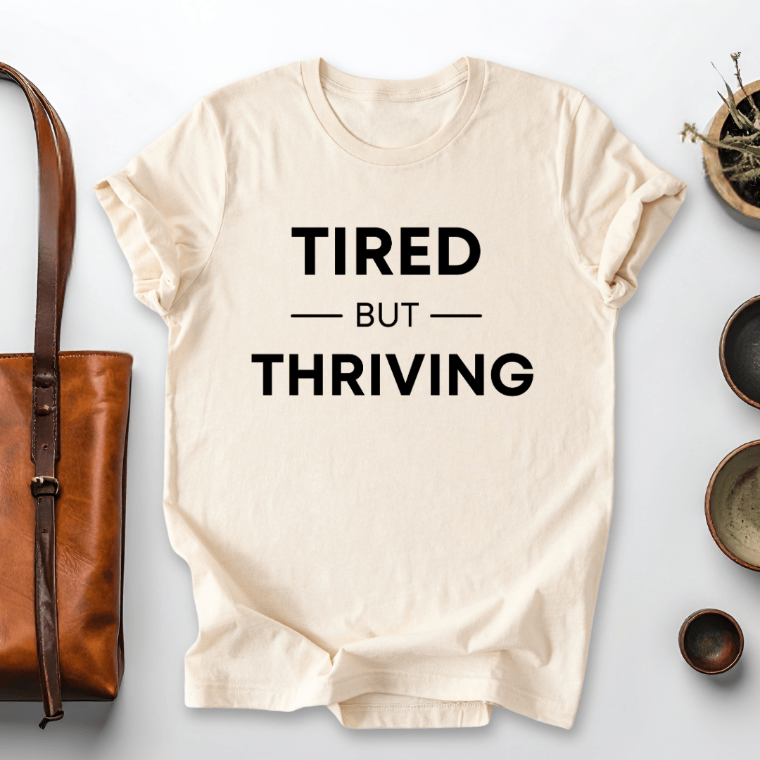 mom life tee that says Tired but Thriving Mom T-Shirt for moms