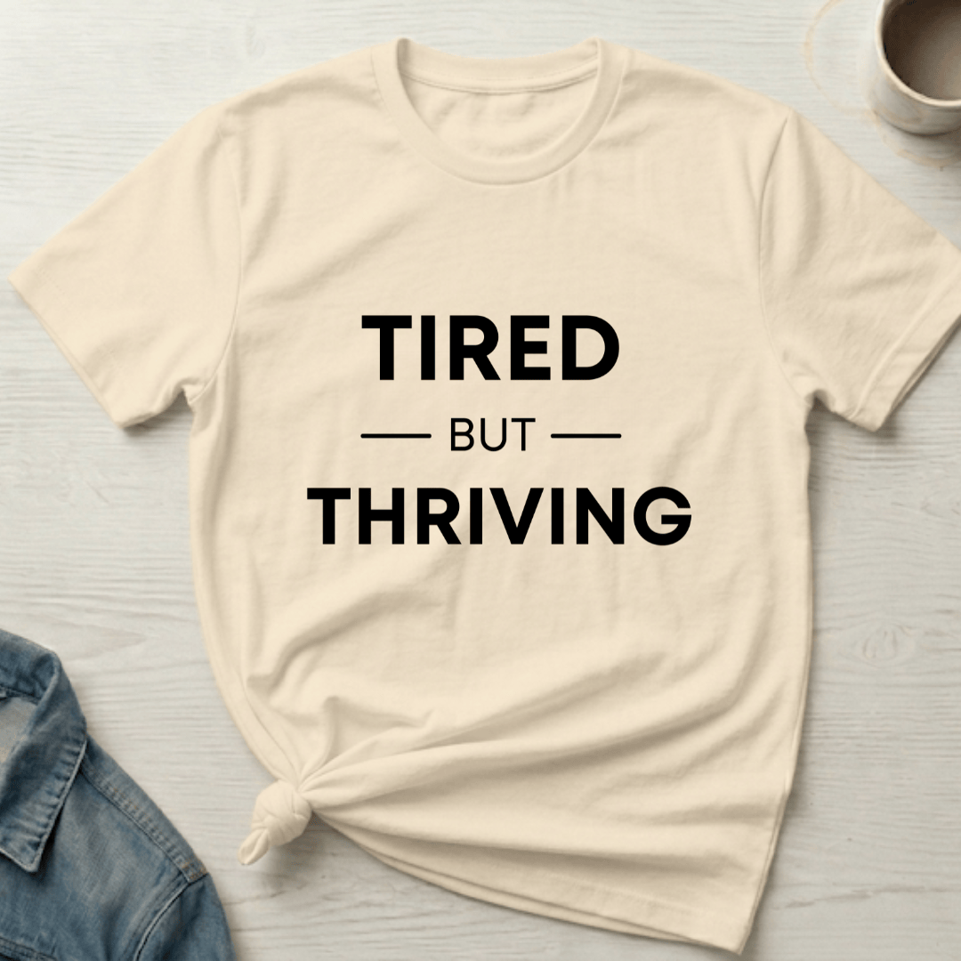 mom life tee that says Tired but Thriving Mom T-Shirt for moms
