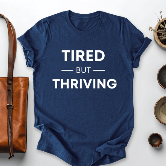 mom life tee that says Tired but Thriving Mom T-Shirt for moms
