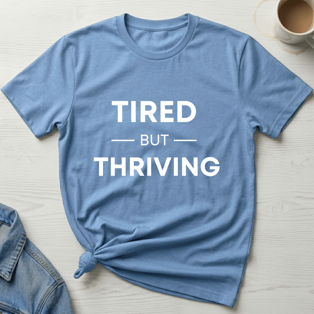 mom life tee that says Tired but Thriving Mom T-Shirt for moms