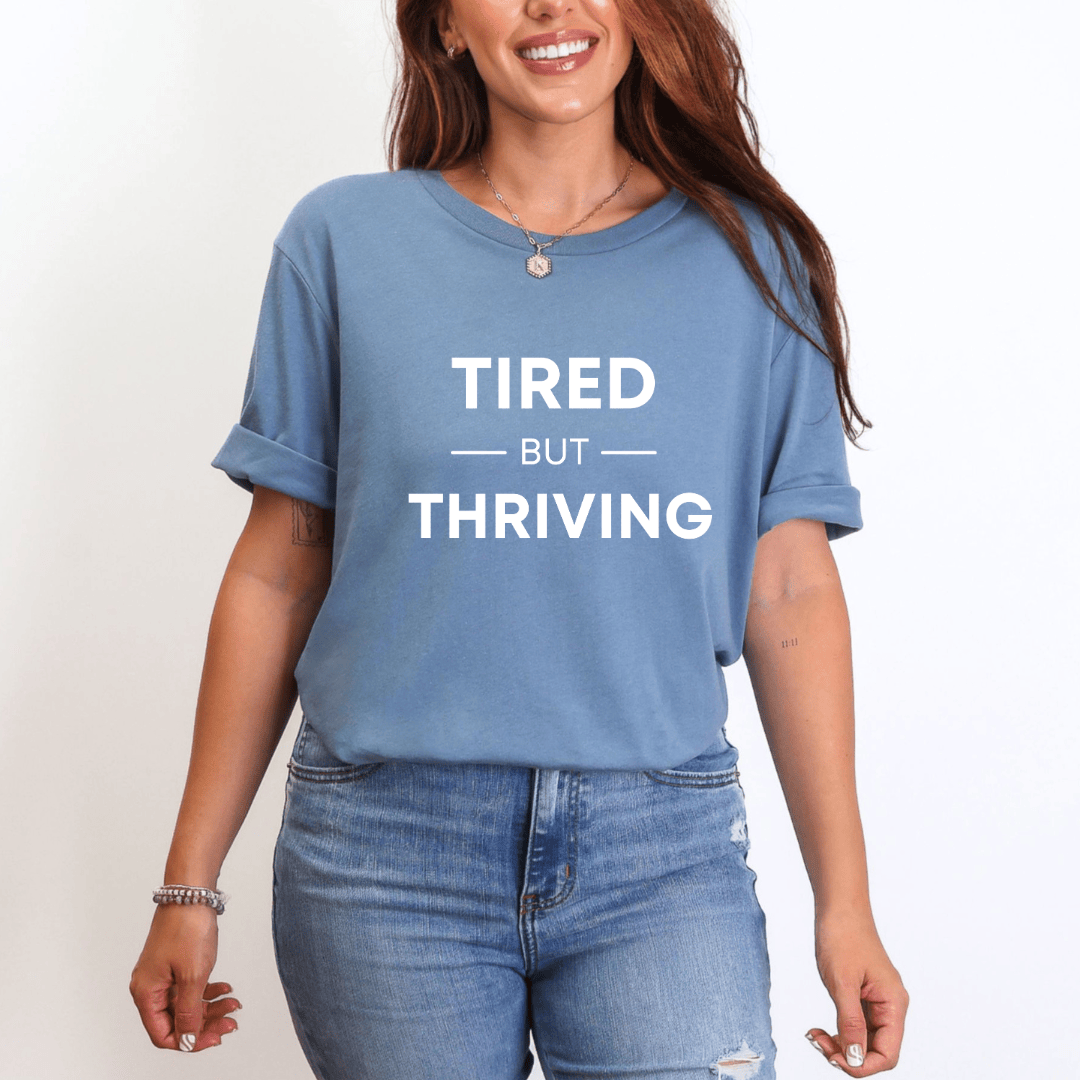mom life tee that says Tired but Thriving Mom T-Shirt for moms