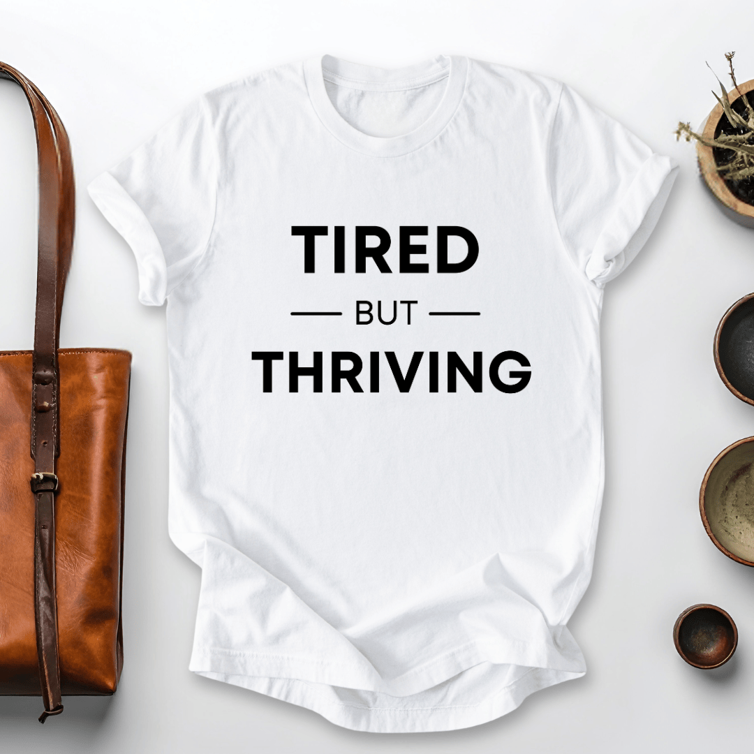 mom life tee that says Tired but Thriving Mom T-Shirt for moms
