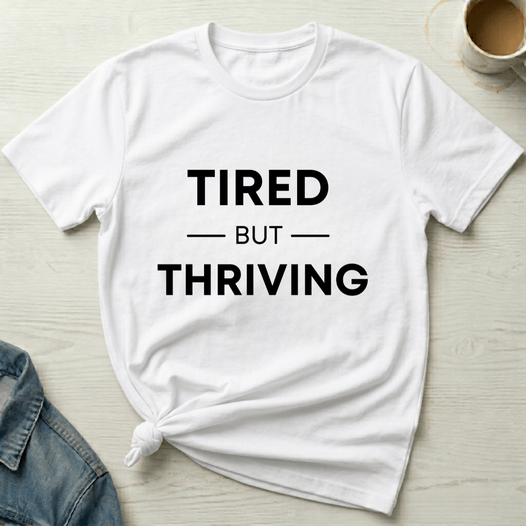 mom life tee that says Tired but Thriving Mom T-Shirt for moms
